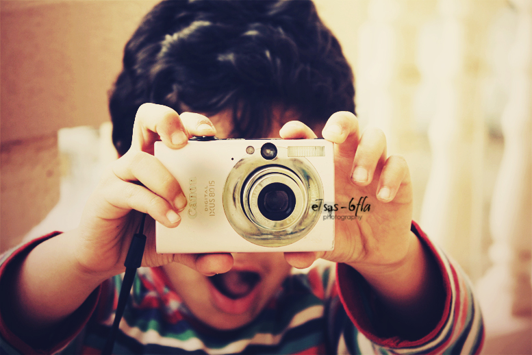 Baby_photographer____Saif_by_E7sas_6fla.jpg